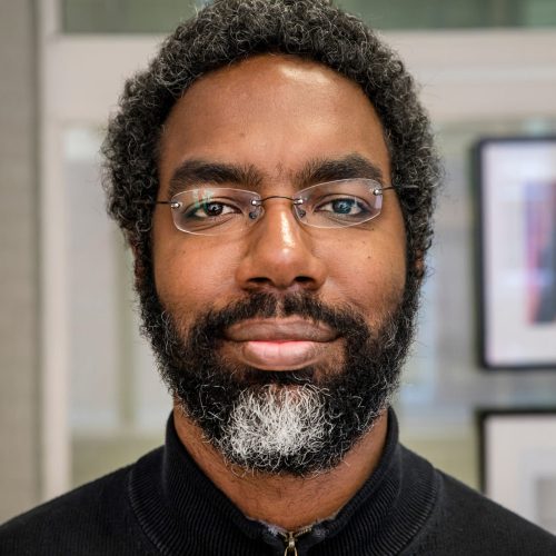 Photograph of Deen Freelon smiling into the camera