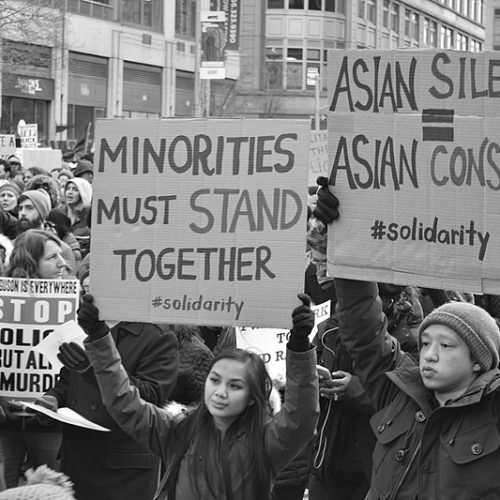 A photo of Asian Americans protesting