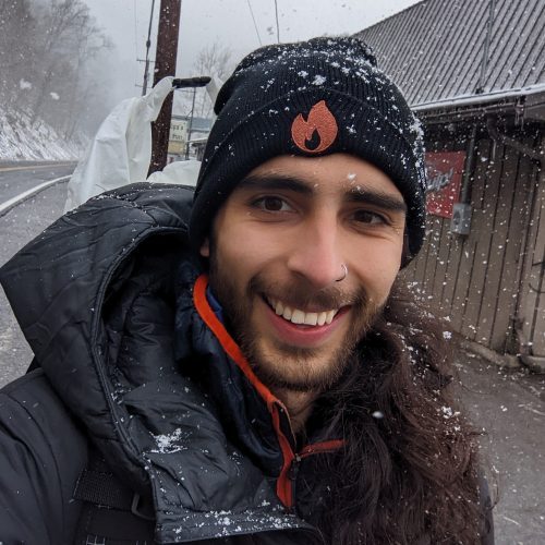 Andre chiquito smiling in the snow