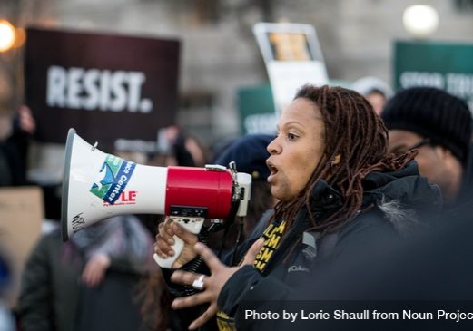 Washington Dc, Usa - January 27, 2017: April Goggans Speaking At Rally Against Trump’s Muslim Ban by Lorie Shaull from NounProject.com
